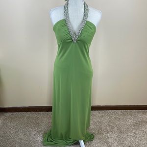 Green halter dress size 10. Never worn. Needs TLC see pics.